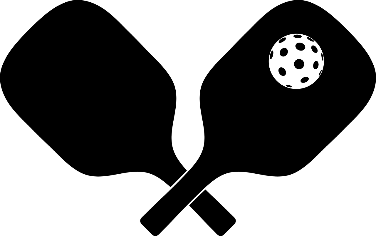 Silhouette of a floorball player hitting a ball with a stick